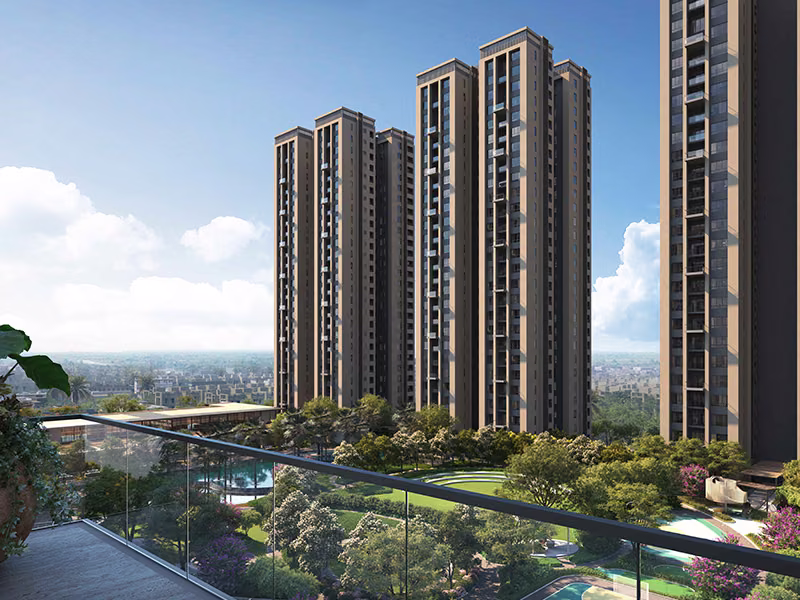 View of the towers and podium greens from an apartment balcony